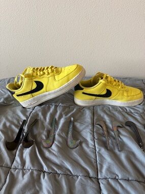 Nike Air Force 1 Yellow Low-Top Sneakers with Black Swoosh